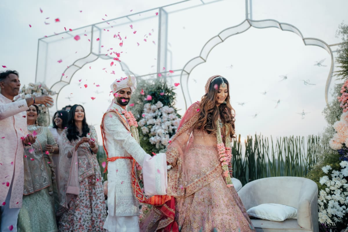 cinematic wedding reception frame in Oxford Golf Club , Pune by FineShot Weddings