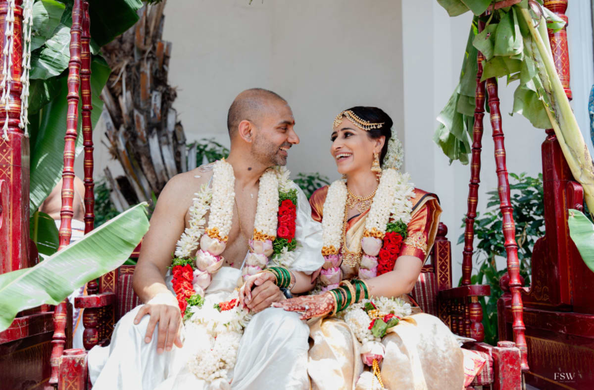 cinematic wedding reception frame in  Taj Krishna ,hyderabad by FineShot Weddings