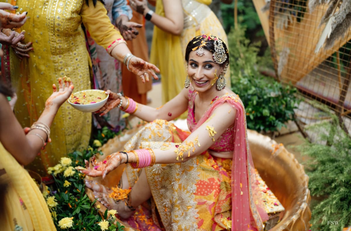 cinematic wedding reception frame in  Taj Krishna ,hyderabad by FineShot Weddings