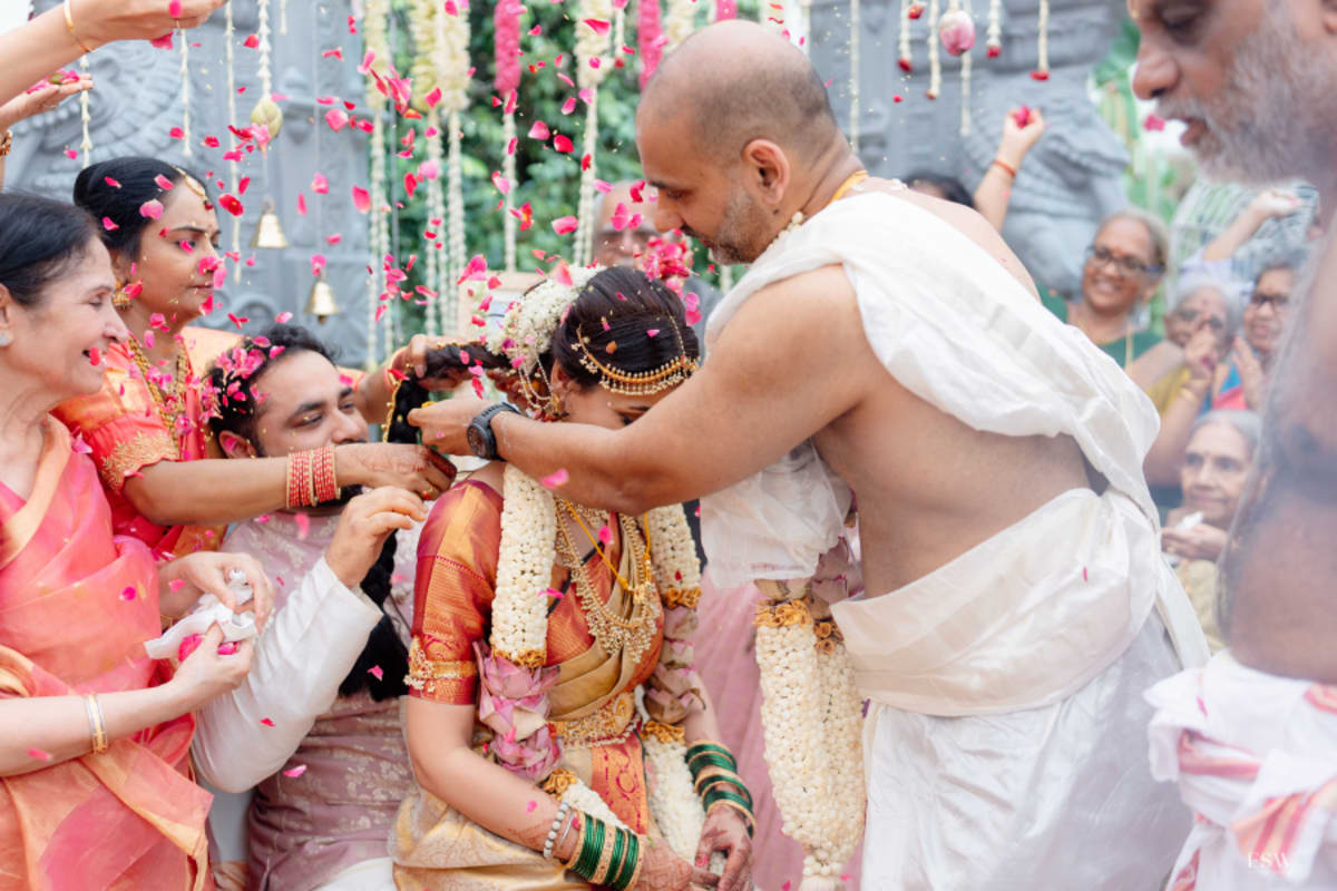 cinematic wedding reception frame in  Taj Krishna ,hyderabad by FineShot Weddings