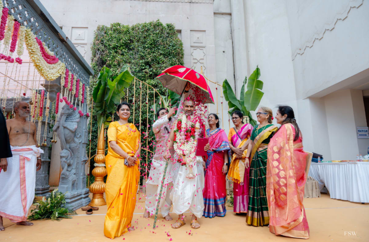 cinematic wedding reception frame in  Taj Krishna ,hyderabad by FineShot Weddings