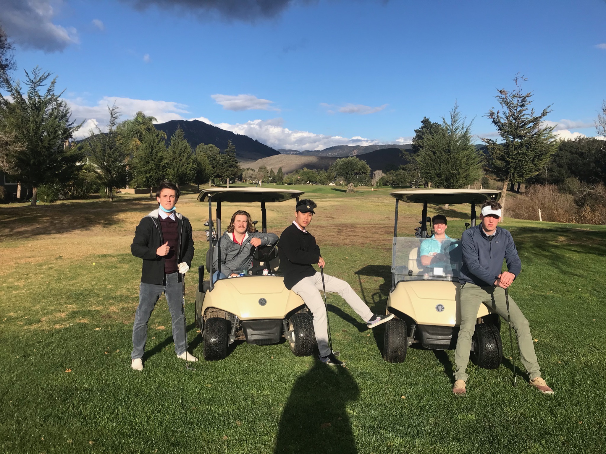 Brothers enjoying a leisurely sunday golf....