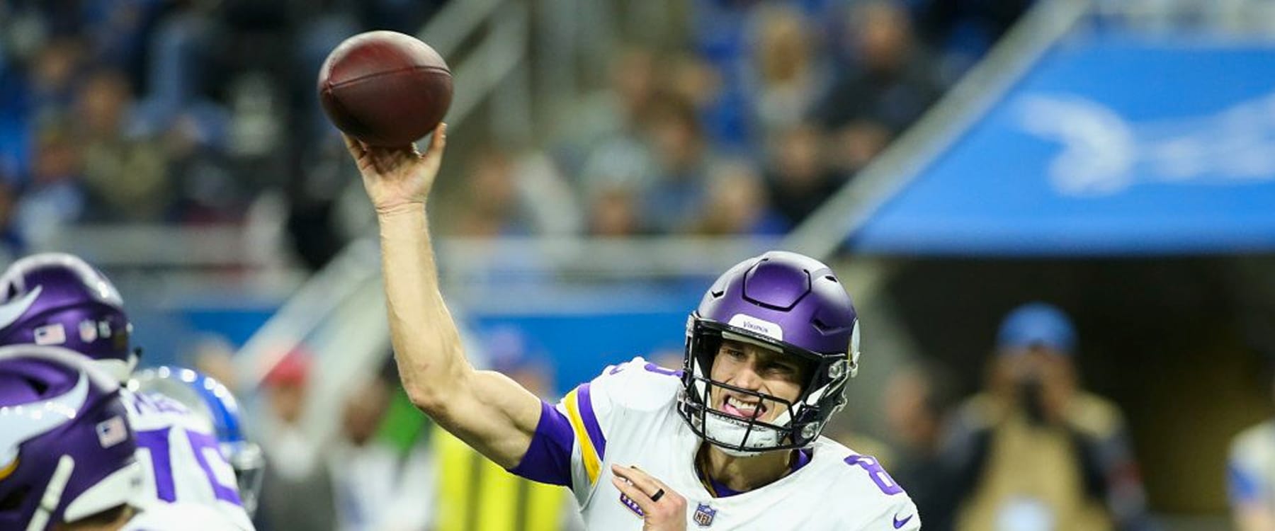 Minnesota Vikings quarterback Kirk Cousins looks to hand off the ball