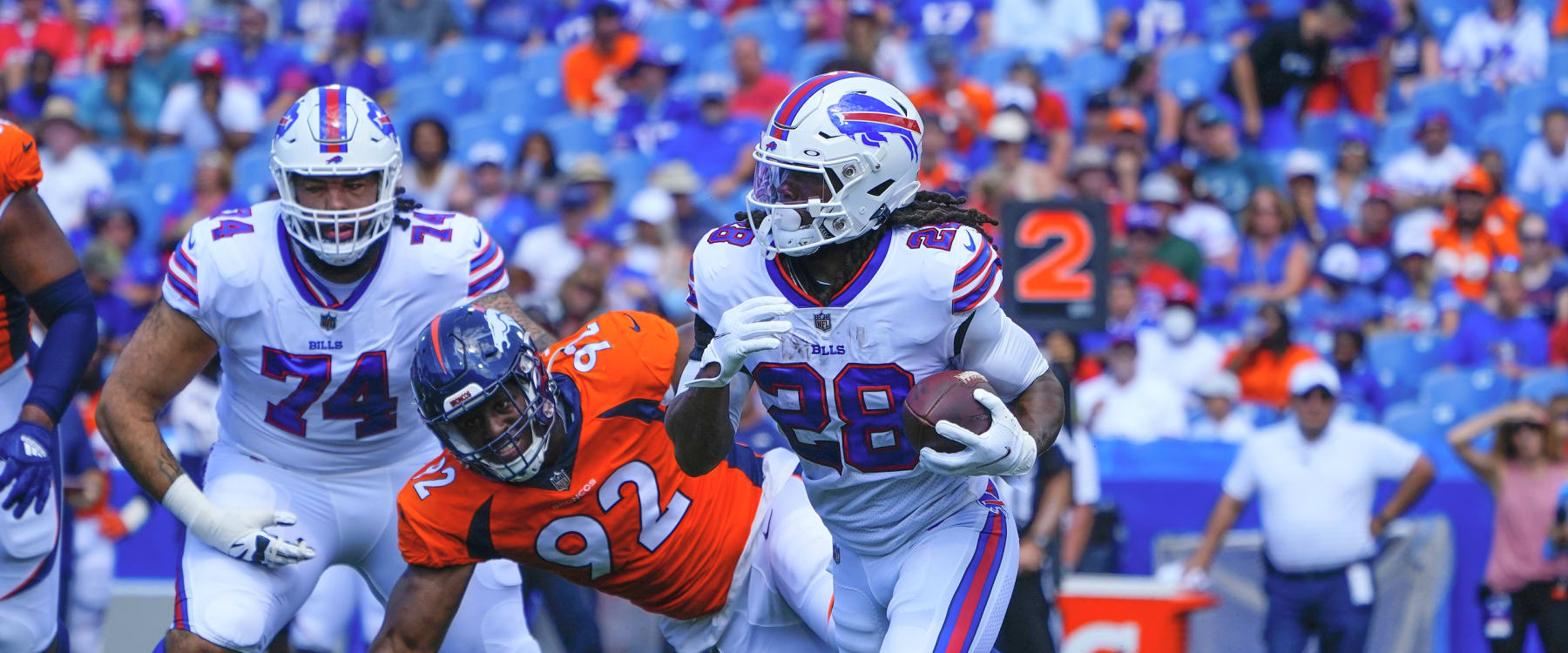 Buffalo Bills running back James Cook (28) runs the ball against the New  York Jets in