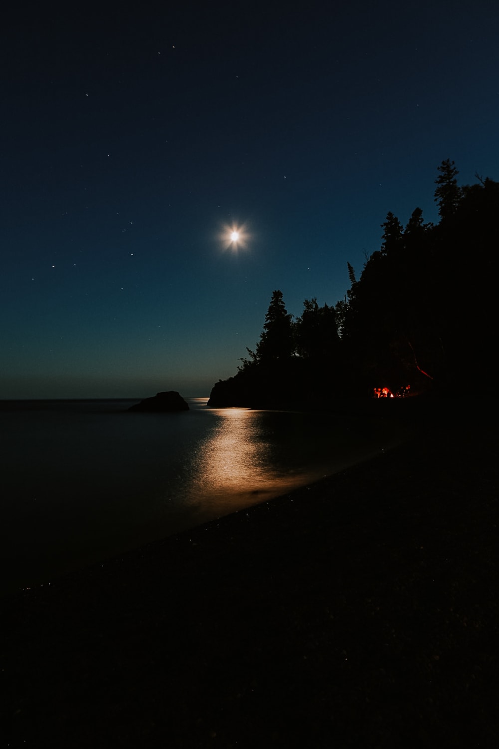 Moonlight reflecting across Lake Superior at night from the North Shore