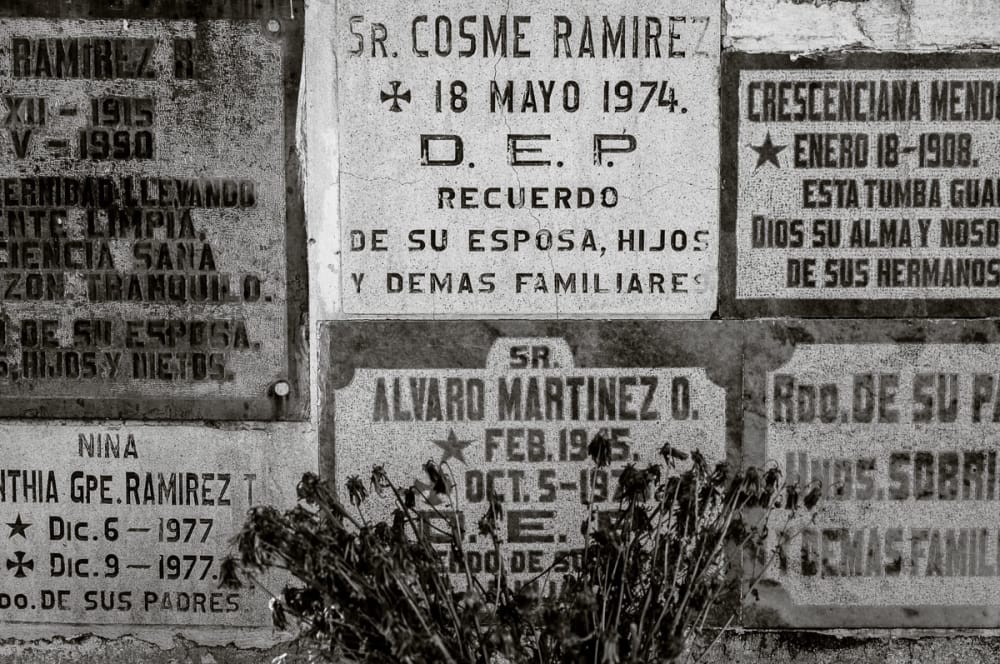 Names carved into headstones in the Chapala cemetery, Jalisco.