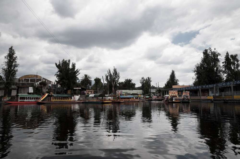 Canals at Xochimilco with boats.