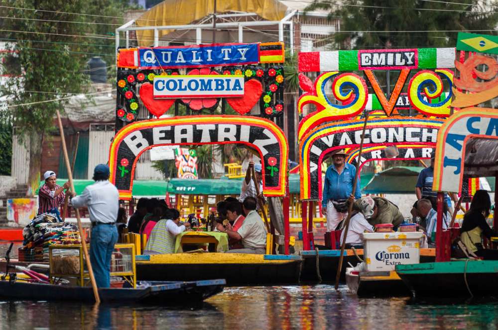 Colorful trajineras at the Xochimilco floating gardens in southern Mexico City.