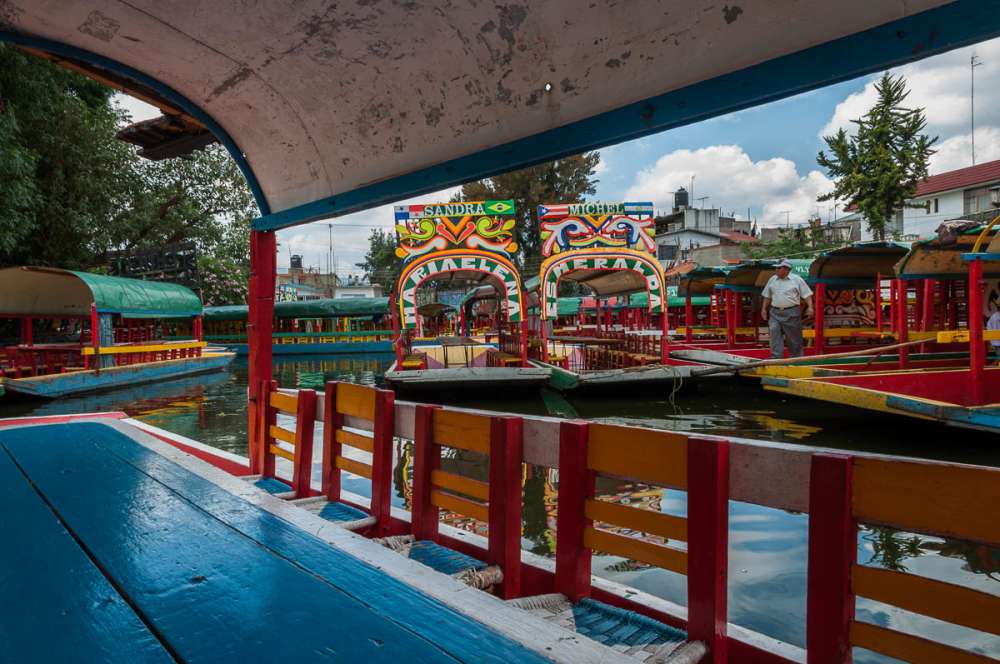 Boats at Xochimilco named Sandra and Michel.