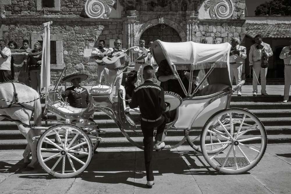 Wooden carriage in Ajijic during a procession for a quinceañera.