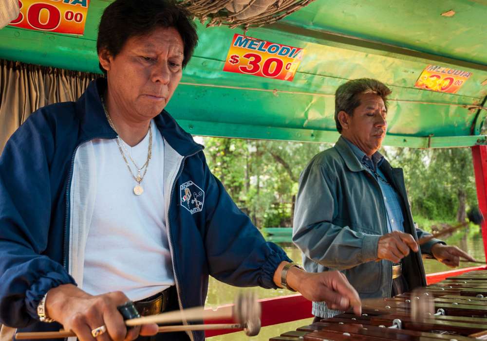 Musicians playing the marimba.