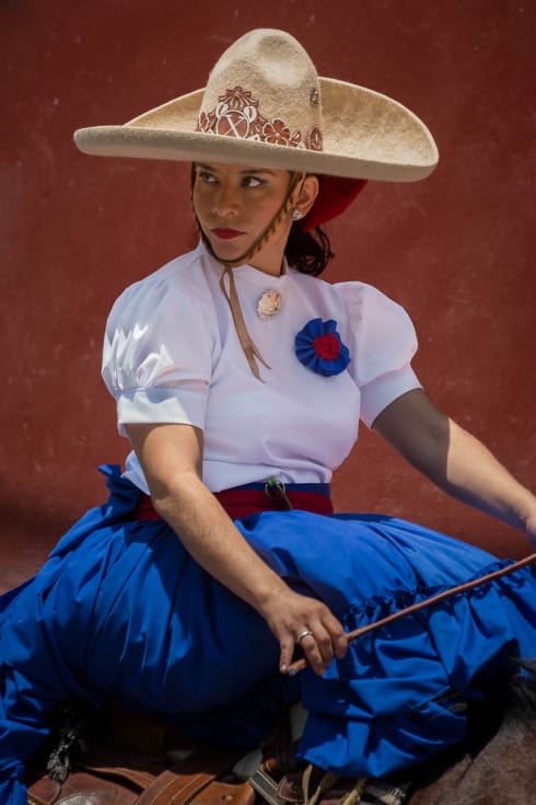 Viridiana García Mariscal, an escaramuza during a parade in Mexico.