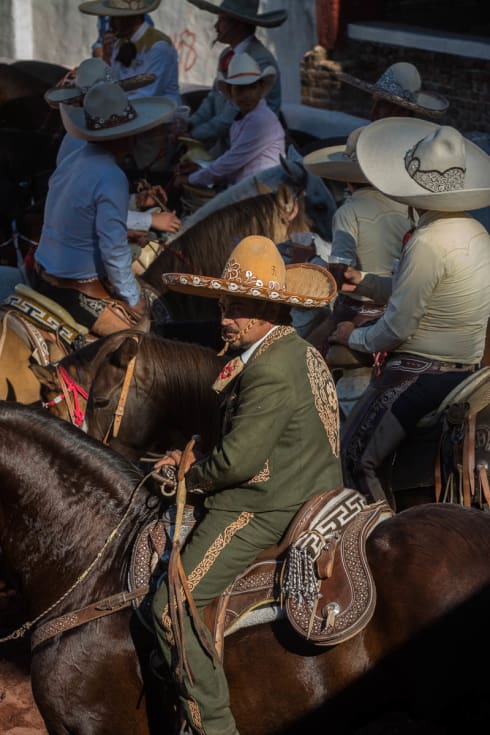 Cowboys in the light of the late afternoon.