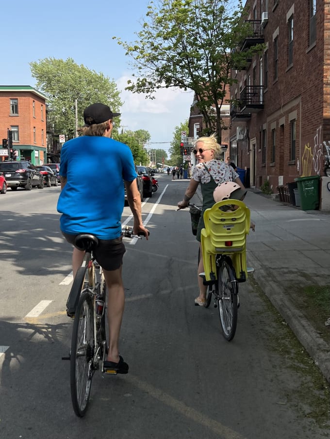 A family riding bikes through Montréal