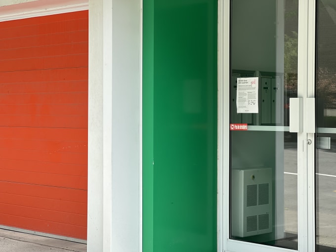 A close up of an apartment building painted with bright colours