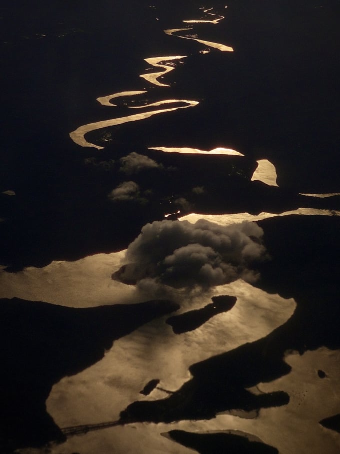 A winding river at sunset, viewed from an aeroplane