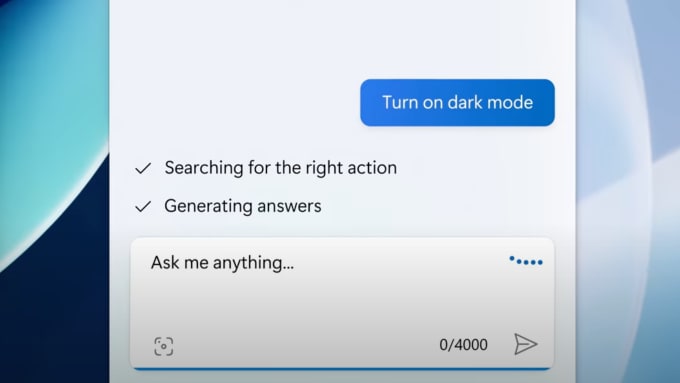 A screenshot of a user prompting the computer to change to dark mode.