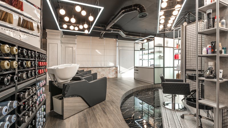 Modern beauty salon interior with professional styling stations in DFW