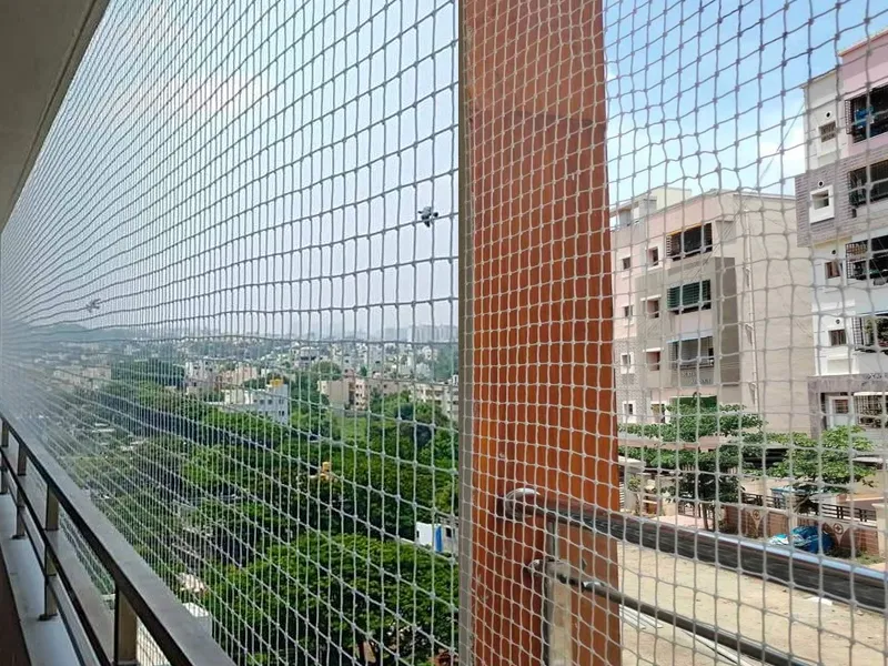 Pigeon net HDPE balcony bird netting installation Hyderabad — KVJ Services