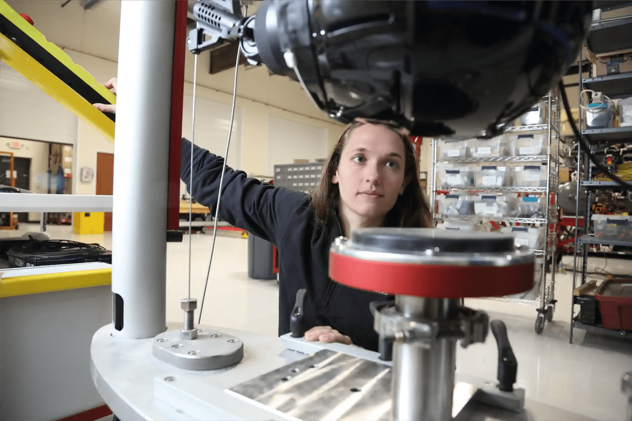 Young woman working in biomechanical lab