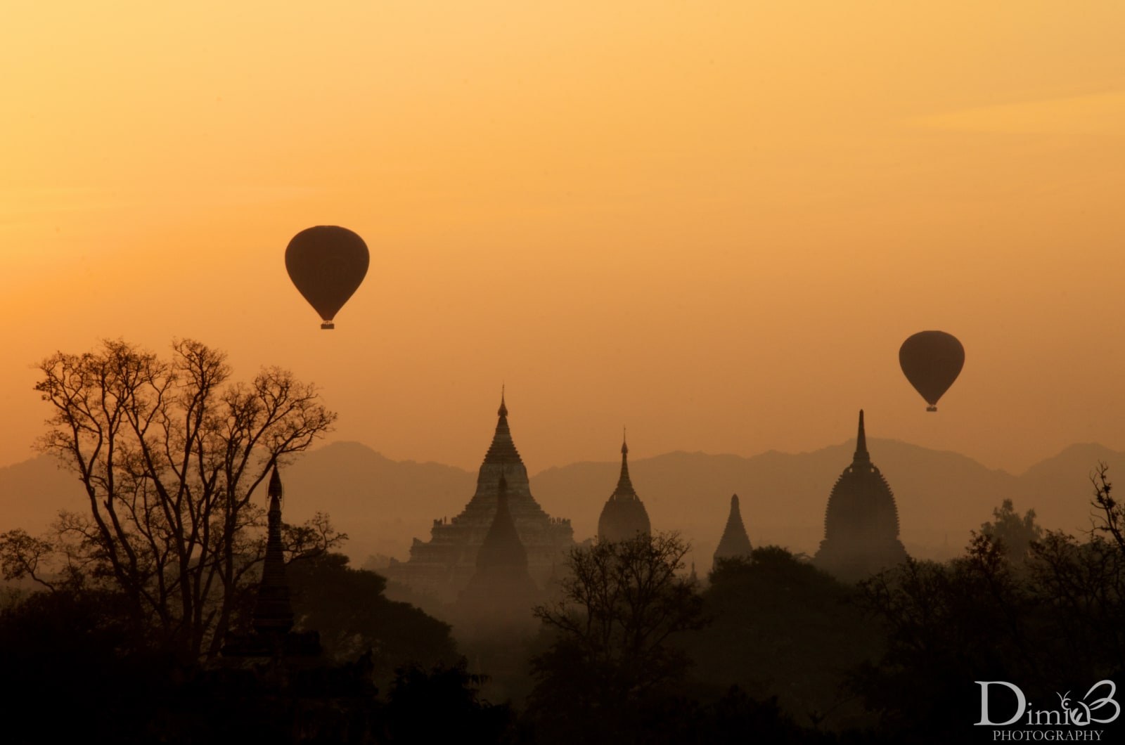 Hot air balloons over Bagan temples at sunrise — Dimi B Photography
