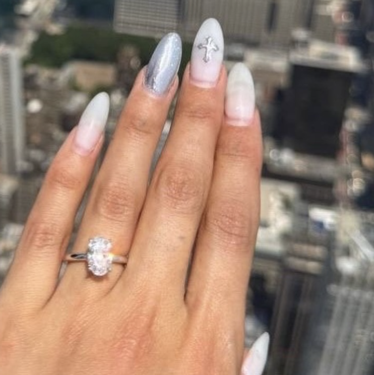 Angela Nikolau and Ivan Beerkus get engaged on top of the Empire State Building before being arrested