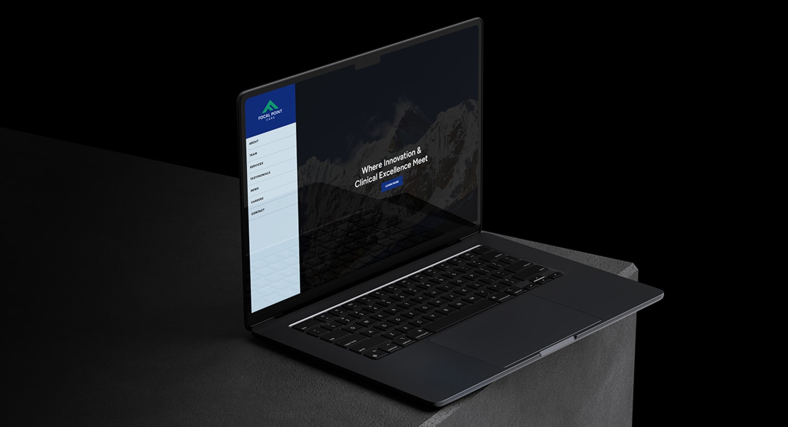 The Focal Point Care website shown on a laptop