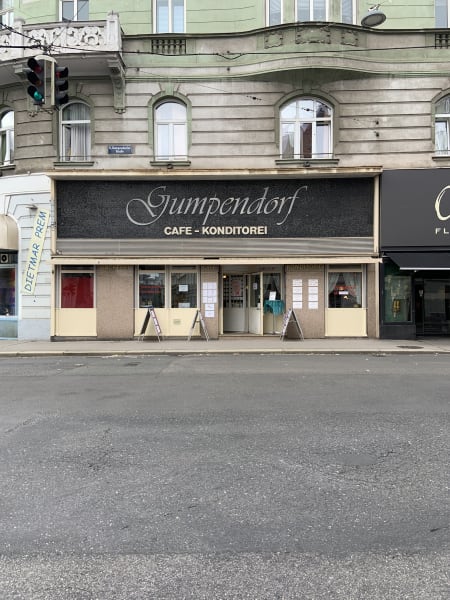 Awning of a Viennese cafe in 1960s style that says Gumpendorf Cafe Condetorei