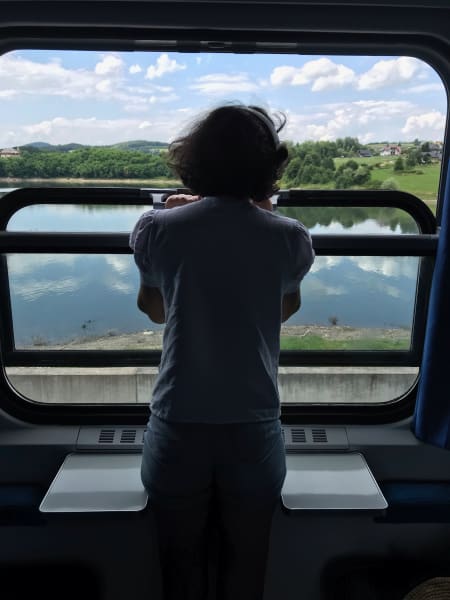 marilia in window of train