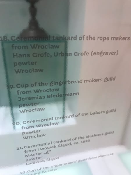 sign in museum that says cup of the gingerbread makers guild wroclaw