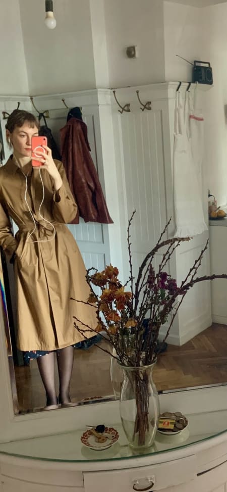 selfie in belted trench