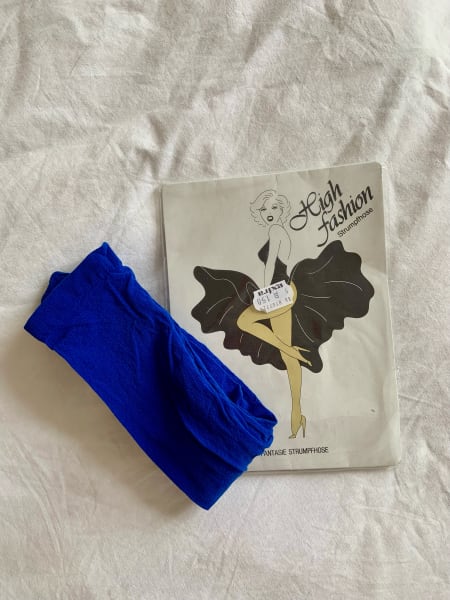 blue tights next to packaging