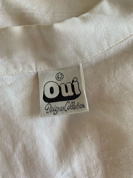 oui tag on linen shirt