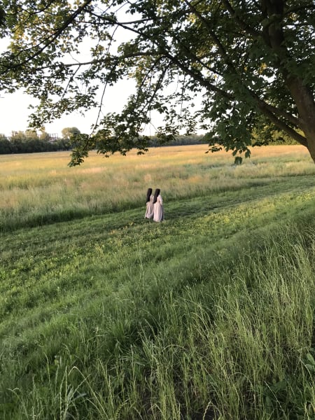 two nuns walking in błonia