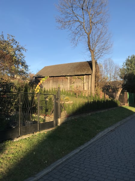 sunlit barn in lanckorona
