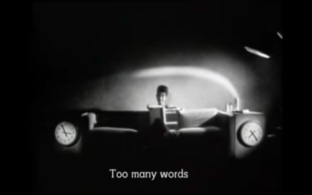 Ken McMullen - Ghost Dance (1983), Pascale Ogier sits on couch in black and white subtitles say Too many words