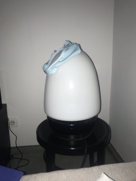 Light blue underwar on an egg-shaped lamp