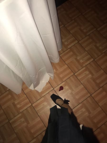 my foot by tablecloth at wedding