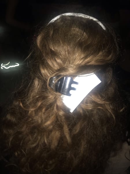 celes's hair with laurel's wind chime business card pinned in at lynn late july event at kaje