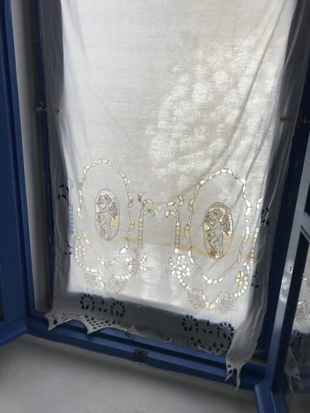 nisyros, curtains with cherubs on them