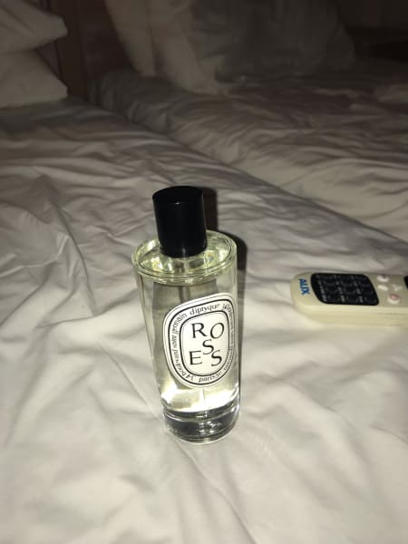 dyptique house spray on hotel bed