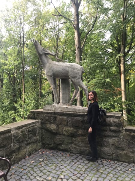 chelsea standing by statue of elk? in krynica