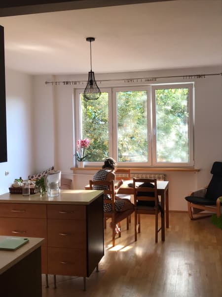 marilia in kitchen in sun