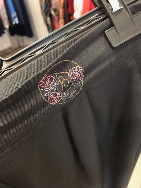 b embroidered on pants at thrift store