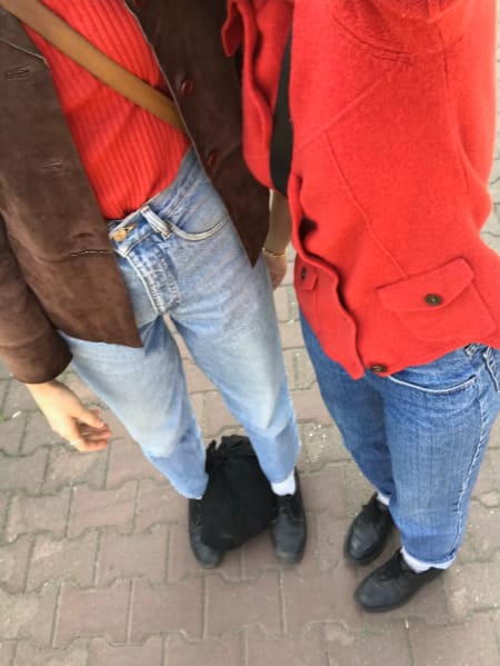 Me and marilia both wearing red tops and jeans