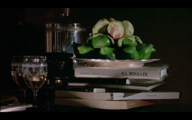 Peter Greenaway -  The Belly of an Architect (1987), still life with stacked books glasses fresh figs