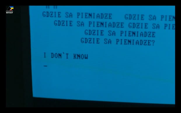 Barbara Sass - Pajęczarki (1993), 90s blue computer screen that reads where is the money in polish typed over and over again and then in English I dont know