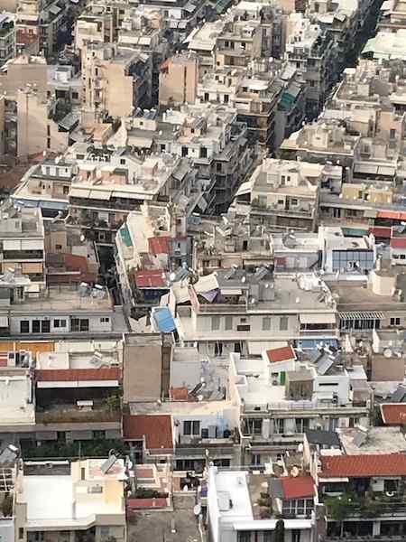 2020 photo from Athens showing cropped photo of rooftops pictured from above