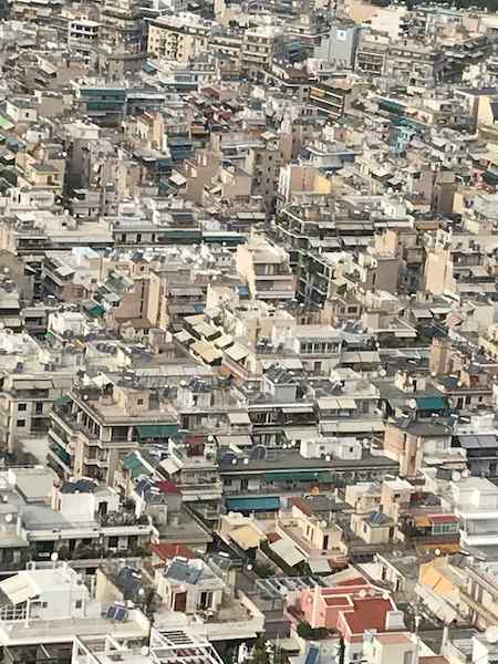 2020 photo from Athens showing cropped photo of rooftops pictured from above