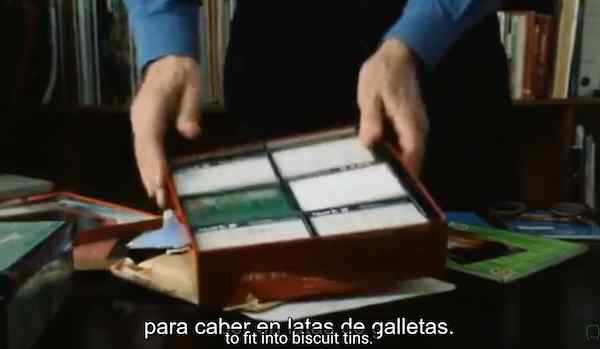 Screenshot from Rohmer documentary showing him storing cassettes in old biscuit boxes